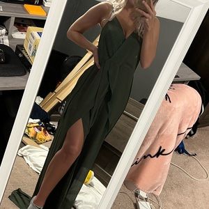 Beautiful green jumpsuit. Only worn once, comes from a clean smoke free home.